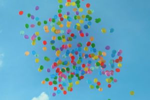 Multi colored balloons in sky